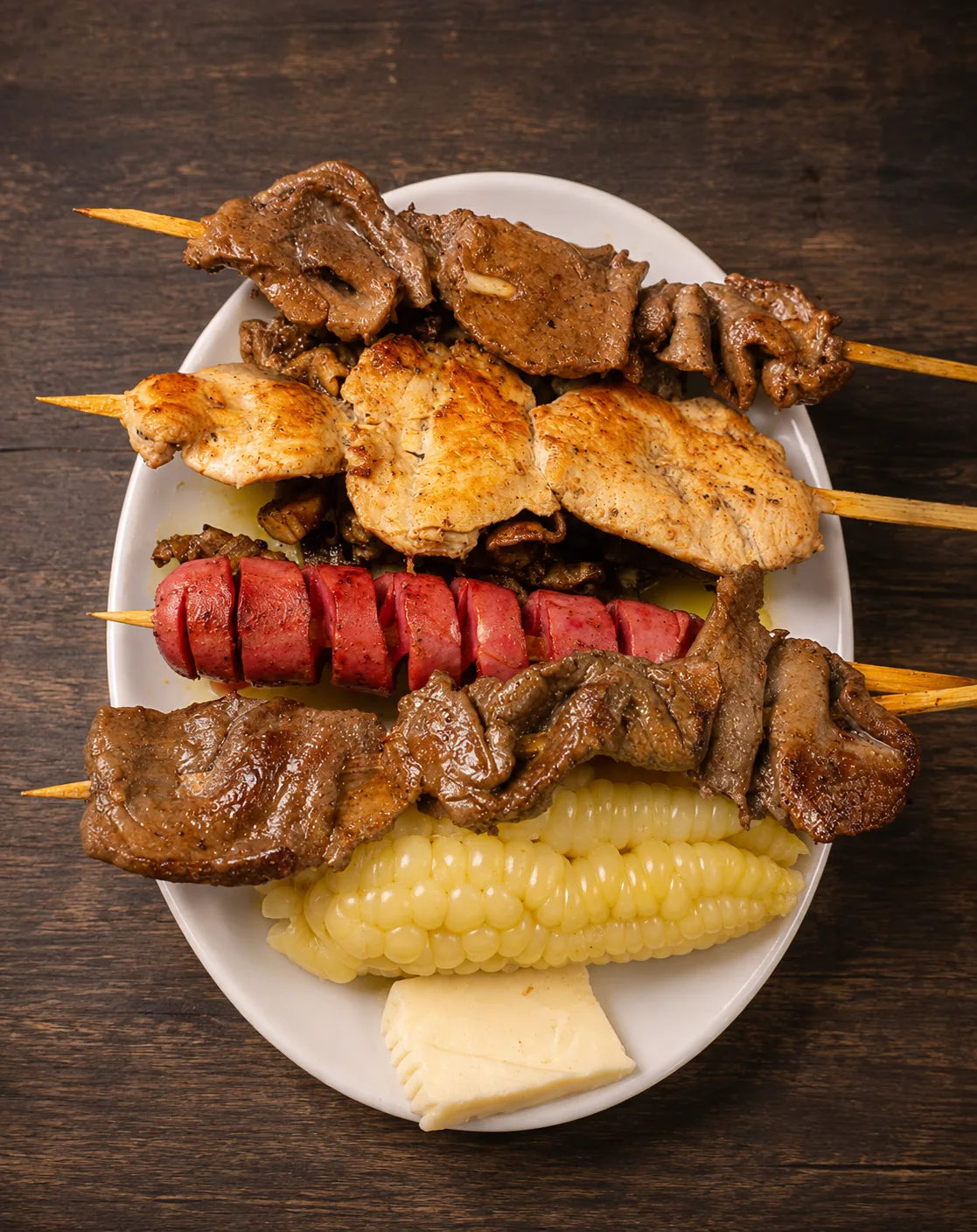 Anticucho mixto S/25